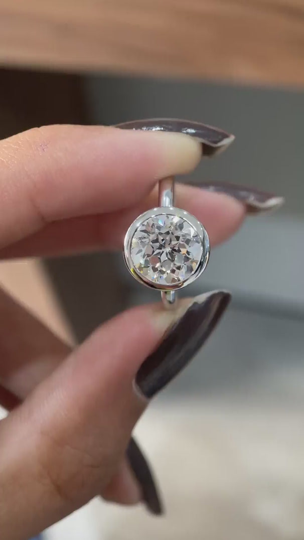 Floating bezel round star cut lab grown diamond ring rotating video