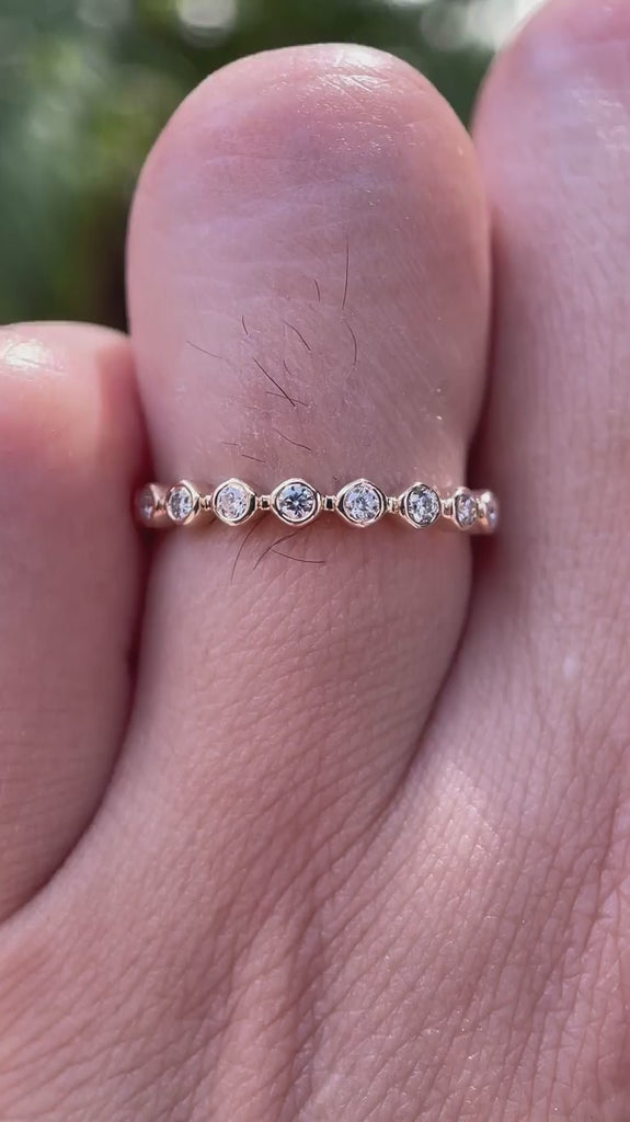 Close-up rotating view of bubble Wedding Band in Yellow Gold