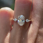 360 video of oval lab diamond trilogy ring in yellow gold