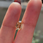 Rotating champagne elongated cushion old mine cut loose moissanite video