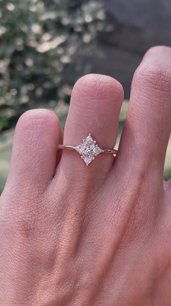 Trilogy marquise cut lab grown diamond promise ring with triangle side stones