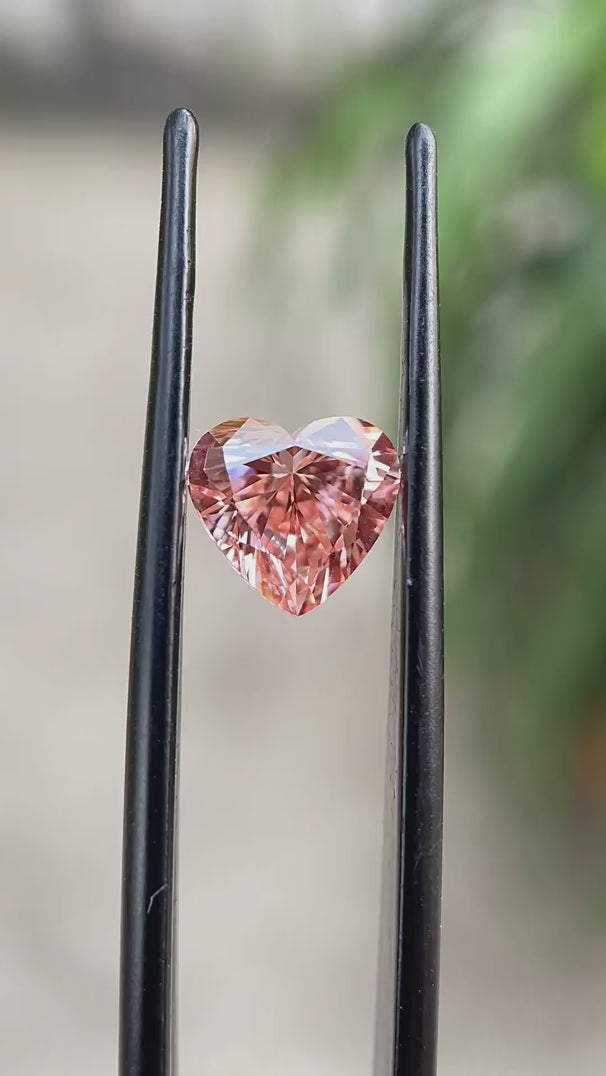 Heart cut pink lab grown diamond video 