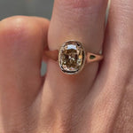 Minimalist signet style moissanite engagement ring on hand video