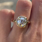 Vintage style bezel set cushion moissanite ring on hand video