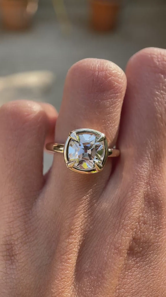 Vintage style bezel set cushion moissanite ring on hand video