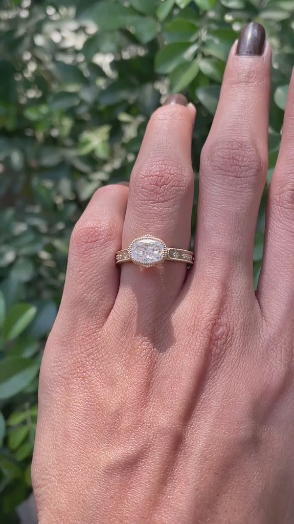 Cushion moissanite starburst ring in 14k yellow gold brushed matte finish