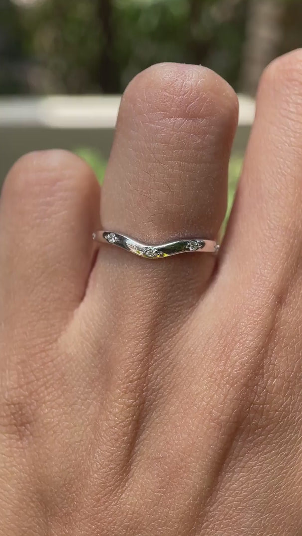 Dainty V shaped moissanite stacking ring on hand video