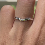 Dainty V shaped moissanite stacking ring on hand video