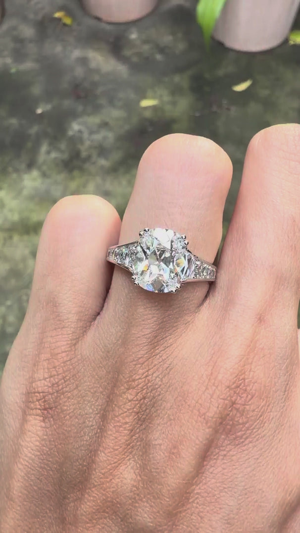 Art deco antique engagement ring, Elongated cushion old mine cut and french cut trapezoid side stones