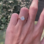 Emerald cut three stone engagement ring in 10k yellow gold on hand video