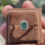 Rose gold oval teal moissanite engagement ring video