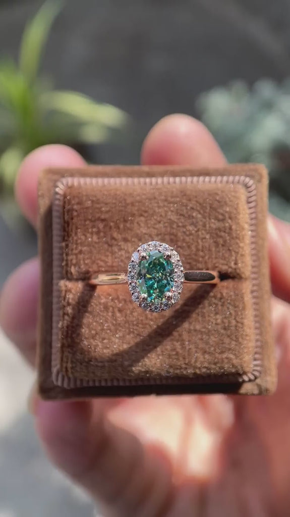 Rose gold oval teal moissanite engagement ring video