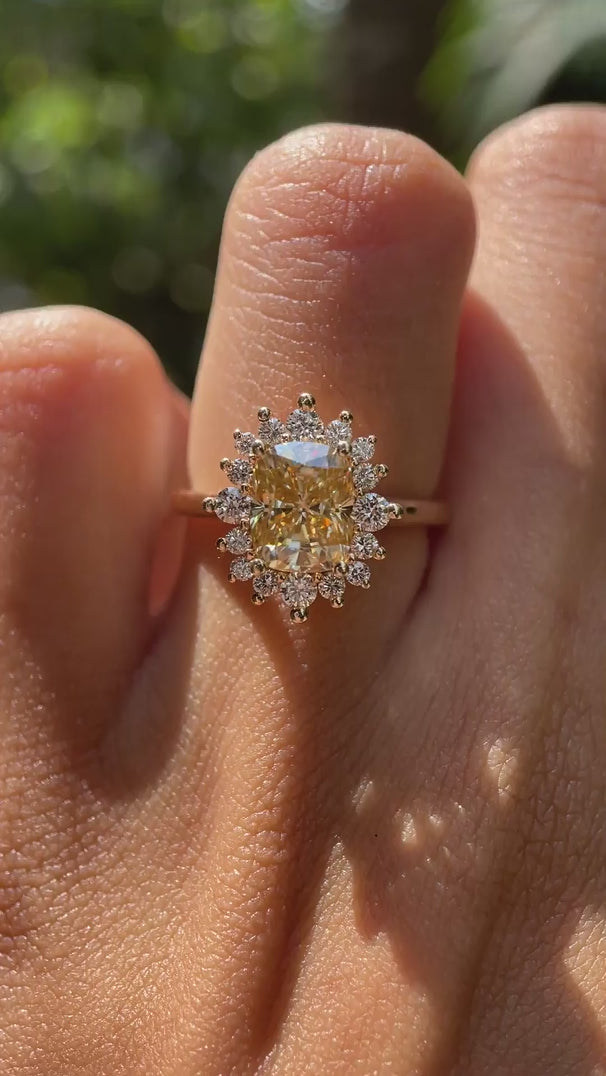 Elongated cushion yellowish champagne moissanite halo ring video