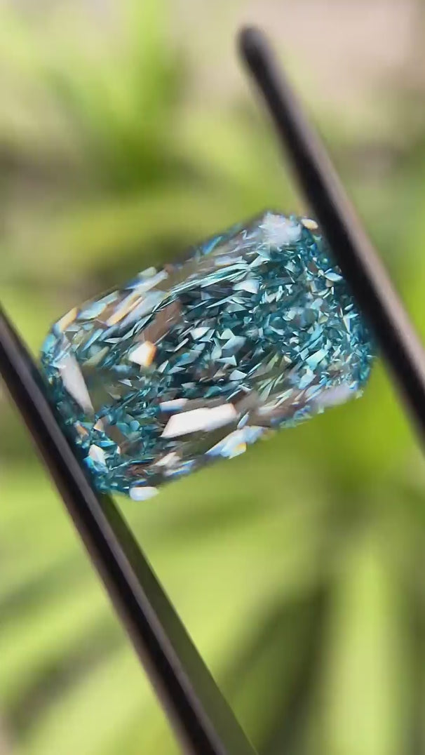 Close-up rotating view of vivid blue radiant loose lab diamond