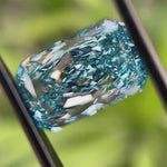 Close-up rotating view of vivid blue radiant loose lab diamond