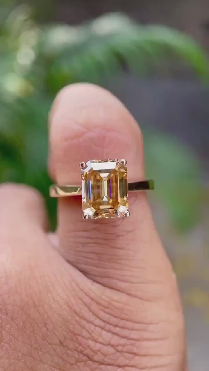 Emerald cut dark champagne moissanite ring video