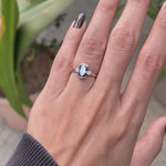 Half bezel set blue moissanite engagement ring on hand video