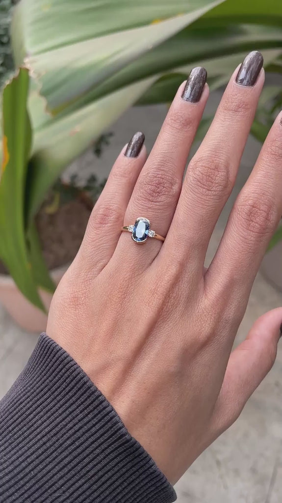Half bezel set blue moissanite engagement ring on hand video
