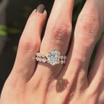 Close rotating view of on hand oval lab diamond ring with stacked diamond band 