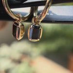 Everyday luxury green moissanite drop earrings in yellow gold video