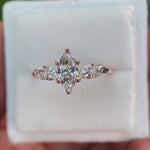 Marquise lab grown diamond cluster engagement ring in 14K rose gold shown from multiple angles