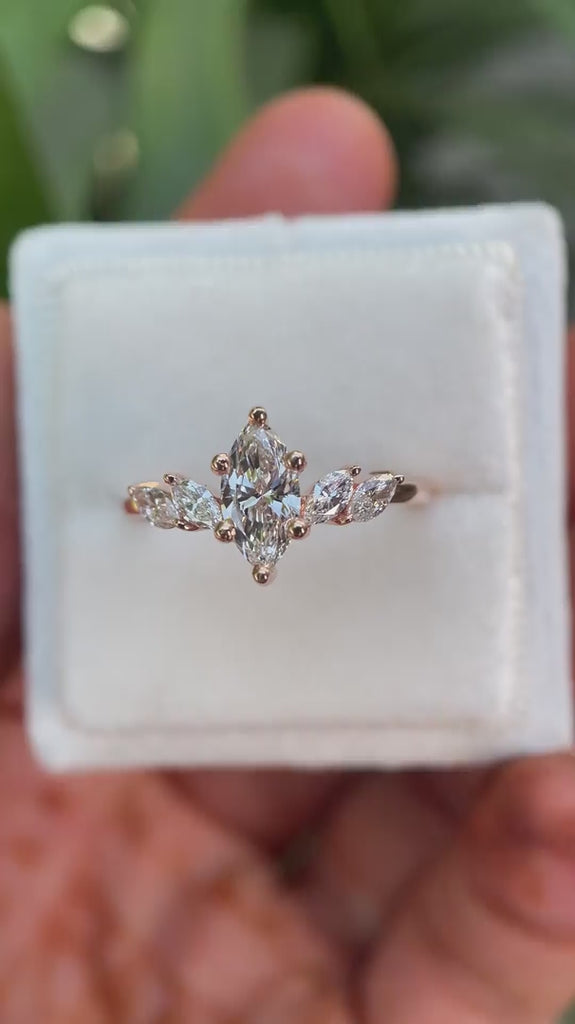 Marquise lab grown diamond cluster engagement ring in 14K rose gold shown from multiple angles