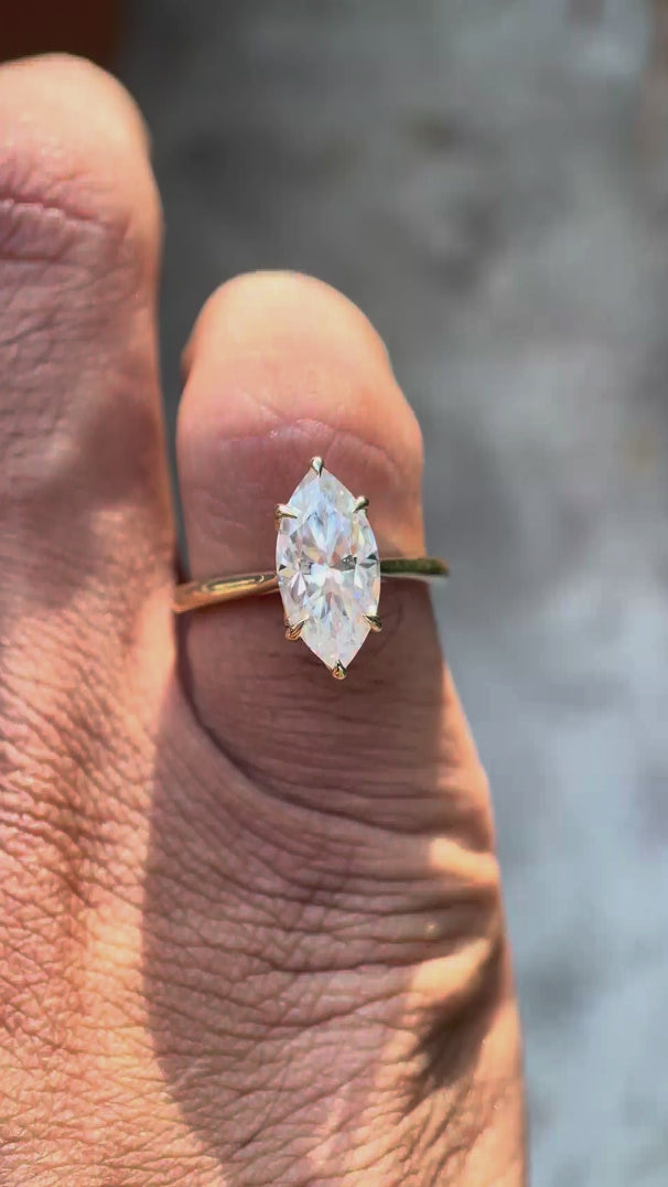 Marquise cut lab diamond engagement ring yellow gold video