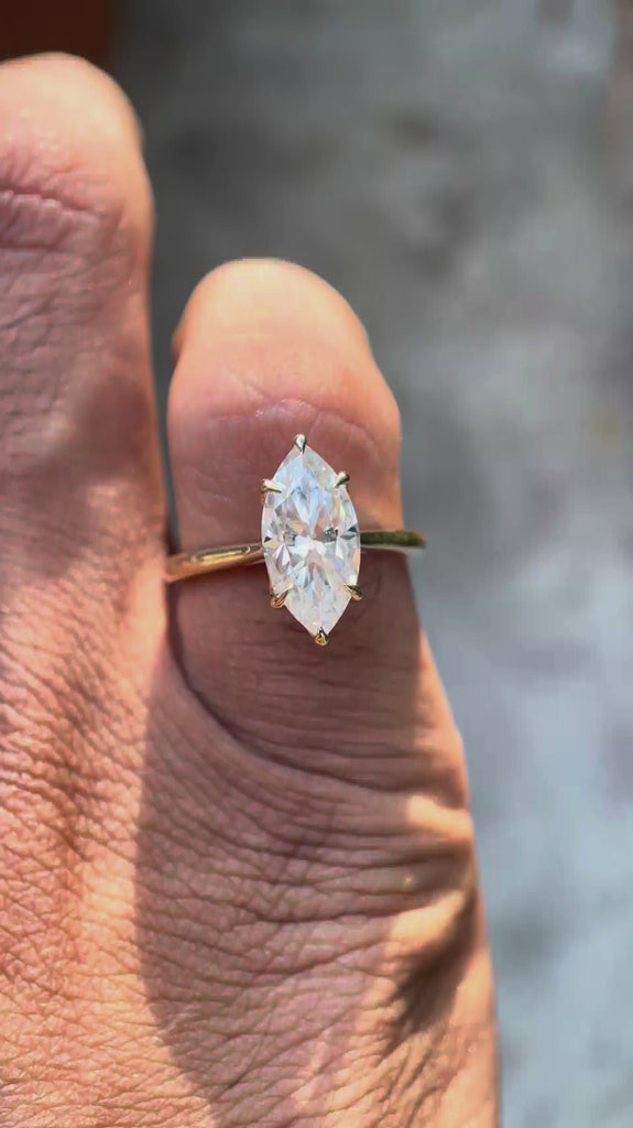 Marquise cut lab diamond engagement ring yellow gold video