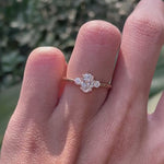 Oval moissanite three stone ring with round side stones video
