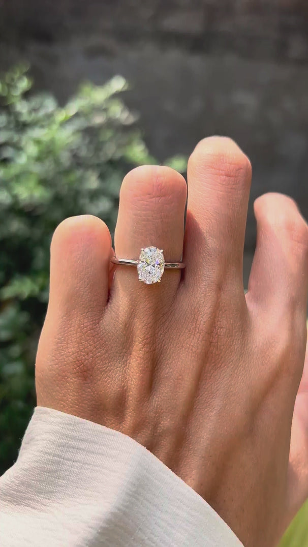 Oval lab diamond solitaire engagement ring on hand video