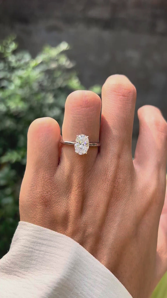 Oval lab diamond solitaire engagement ring on hand video
