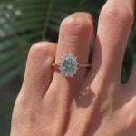 Blue green moissanite halo engagement ring on fingure video