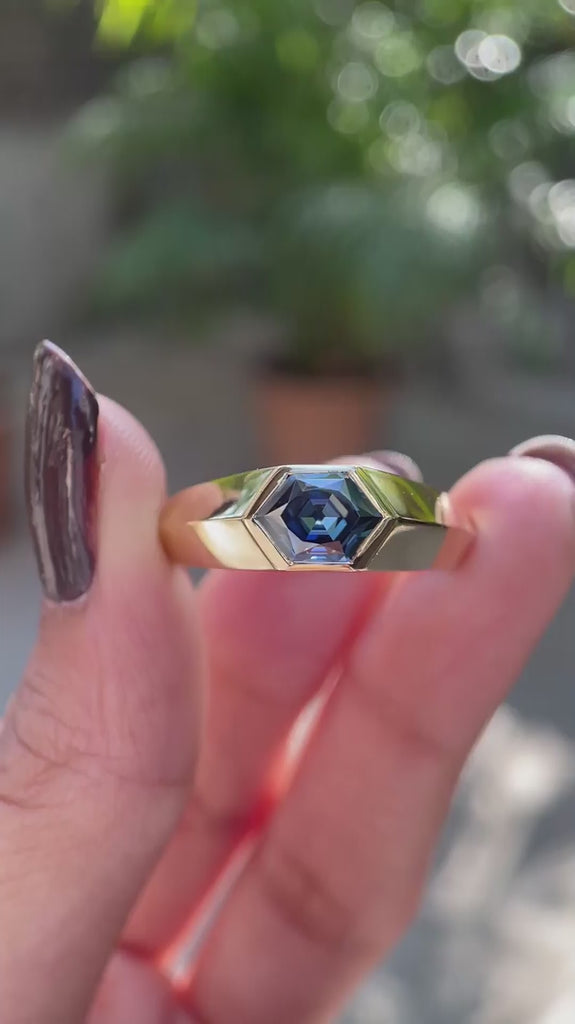 Bezel set hexagon step cut moissanite ring with knife edge tapered band video