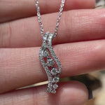 Round brilliant lab diamond swirl pendant necklace white gold