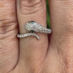Yellow gold snake ring showing diamond pave head detail video