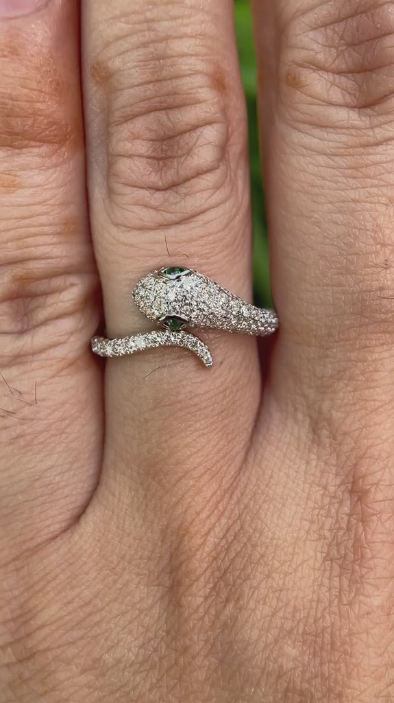 Yellow gold snake ring showing diamond pave head detail video