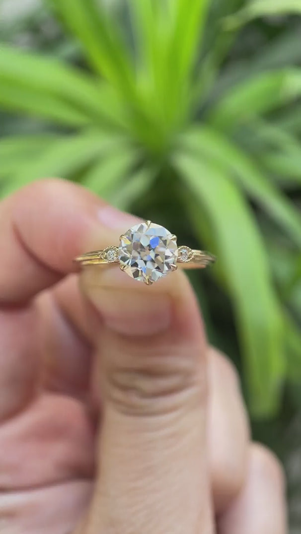 Three stone round Old European cut moissanite engagement ring in 10K yellow gold