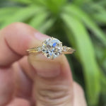 Three stone round Old European cut moissanite engagement ring in 10K yellow gold