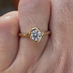 Video showcasing round lab grown diamond solitaire engagement ring in 14K yellow gold