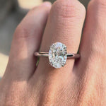 Product video showcasing the oval lab grown diamond solitaire ring in 14K white gold from multiple angles.