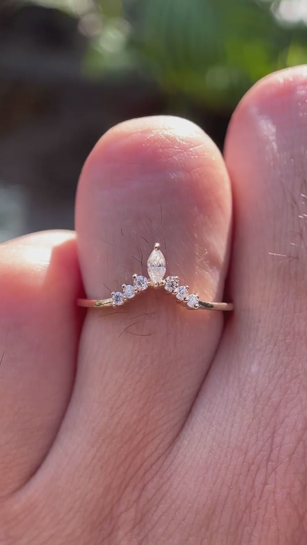 Video showcasing marquise and round cut chevron contour moissanite wedding band sparkle and profile
