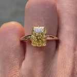 Radiant compass setting yellow engagement ring on hand video