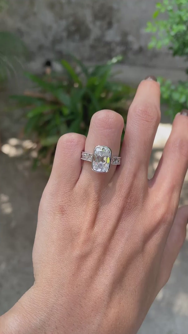 Vintage style cathedral ring with milgrain band and omc cushion stone