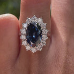 Oval blue moissanite and diamond halo wedding ring video