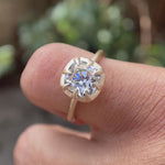 Video showcasing the Square Cushion Old Mine Cut GHI Moissanite Solitaire Bezel Set Engagement Ring in 10K Yellow Gold