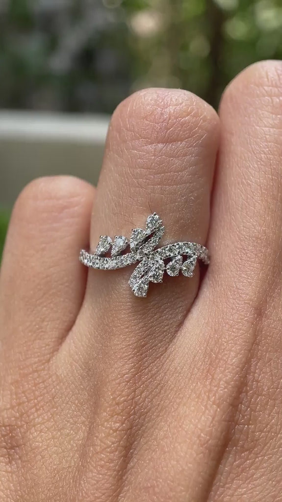 Leaf inspired diamond wedding ring with round brilliant stones video