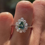 OMC pear shaped blue green moissanite halo wedding ring video