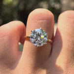 Rotating video showing round brilliant moissanite hidden halo ring
