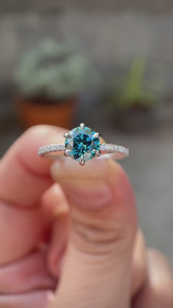 Round fancy vivid blue lab grown diamond solitaire ring with pavé band