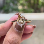 Pear champagne moissanite half halo engagement ring video